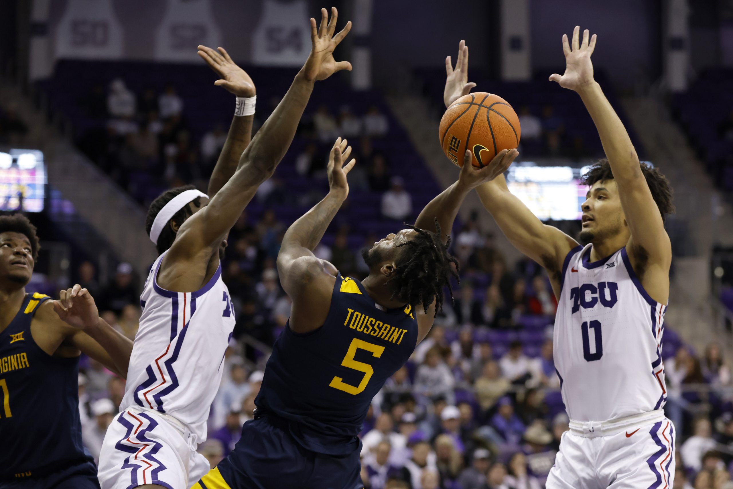 Short-handed TCU holds off WVU without star guard Mike Miles Jr.